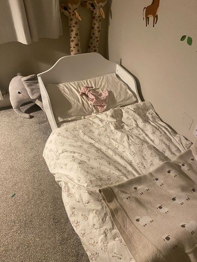 White Wooden Toddler bed