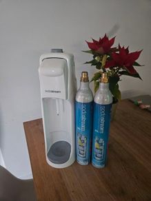 Sodastream and two empty cylinders