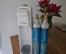 Sodastream and two empty cylinders