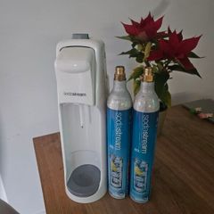 Sodastream and two empty cylinders