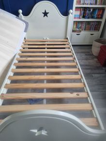 Pair of single beds with mattresses