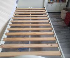 Pair of single beds with mattresses