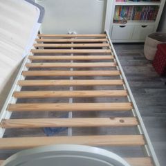 Pair of single beds with mattresses