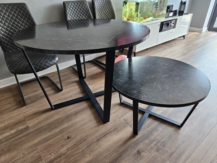 Round dining table with a matching coffee table