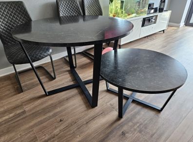 Round dining table with a matching coffee table