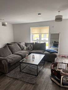 large corner sofa & pouffe