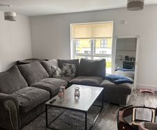 large corner sofa & pouffe