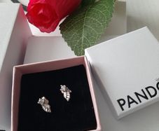 New genuine pandora angel wing earrings
