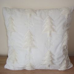 Festive cream cushion Christmas trees motif