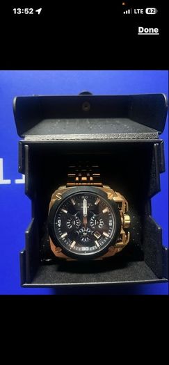 Diesel Watch Original box Brand new An oversized case, multi-layered black chronograph dial, and thick multi-link bracelet make the gold-tone Diesel BAMF watch a force  Case