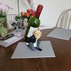 Wine waiter bottle holder