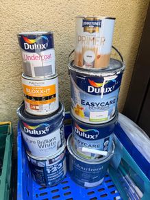 Unopened & opened white paint