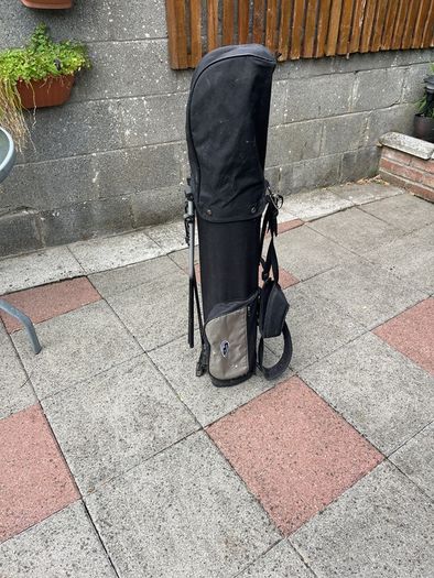 Left hand golf clubs and stand