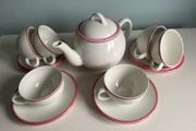 Bargain as new modern teaset with Teapot with six cups and saucers with pink trim