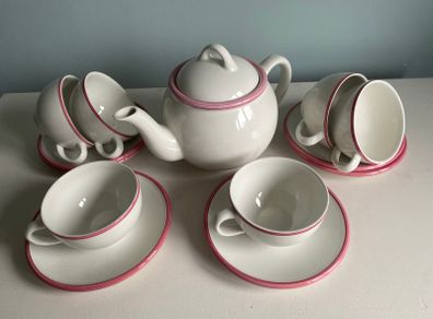 Bargain as new modern teaset with Teapot with six cups and saucers with pink trim
