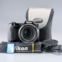 Nikon Coolpix L110, a black bridge-style digital camera