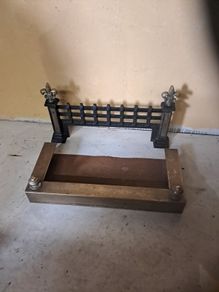 iron grate and brass