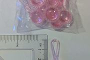 Pink plastic baby shower pacifier charms - pack of 10