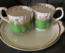 Vintage Royal Albert Regal Series bone china teacups in green with gold floral filigree