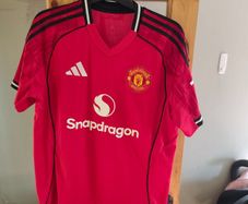 Assortment of Manchester United Jersey's.