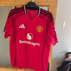 Assortment of Manchester United Jersey's.