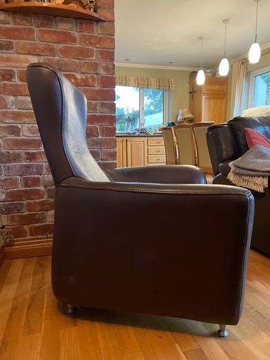 Real leather brown arm chair with foot stool