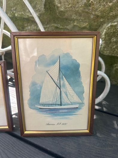 Two small framed prints of boats