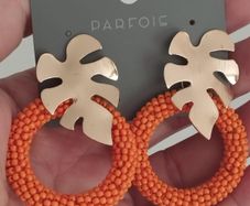 Bright earrings.