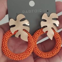 Bright earrings.