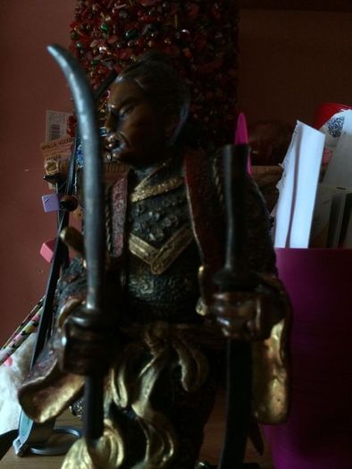 A fine bronze of a samurai signed  MIYAO