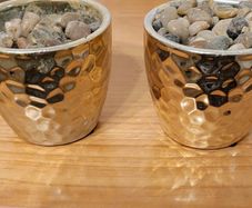 Matching vases with stone & oasis foam.