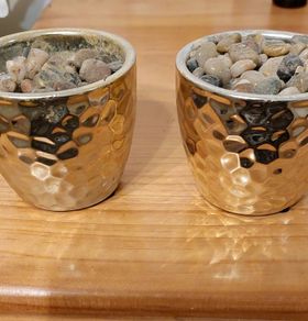 Matching vases with stone & oasis foam.