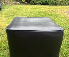 Free black leather style ottoman