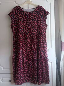 Loose Fit Dress with red and black print.