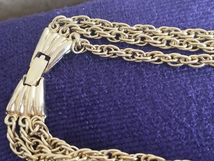 Vintage gold tone multi chain necklace with beautiful clasp.