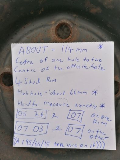 2 x steel rims 15", 4 stud, about 114mm ish from hole centre to the opposite home centre... Possibly fit a nissan etc