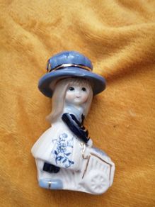 Porcelain girl figurine
