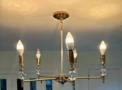 Two brass chandeliers