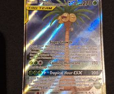 Rowlet & Alolan Exeggutor GX (Unified Minds 215) pokemon card