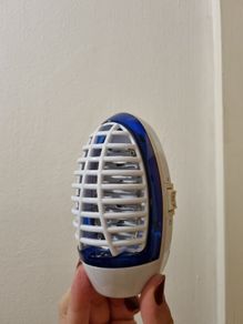 Plug in pest repeller and night light