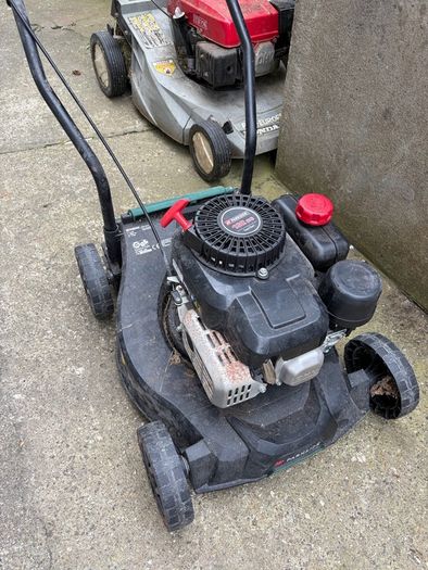 2 Petrol Lawnmowers - Free to take together