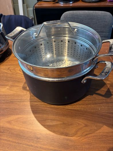 Set of All Clad pots and pans