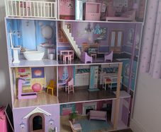 Large wooden dolls house with furniture