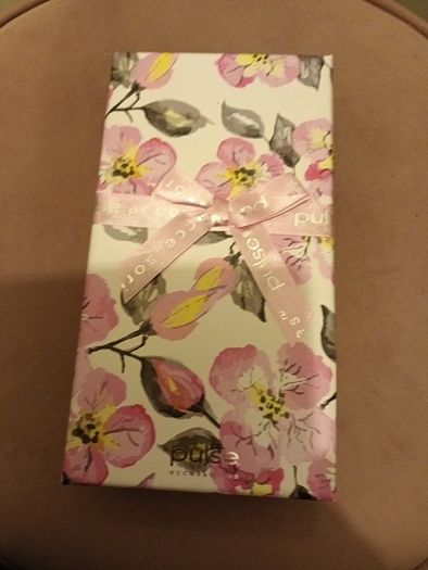Pink wallet in gift box