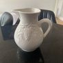Vintage ceramic pitcher with embossed decoration Image 2