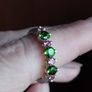 A 925 sterling silver ring with green and pink stones. Image 9