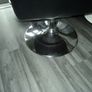 Black leather swivel chair with foot stool Image 2