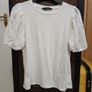 White t-shirt detailing on sleeves Image 3