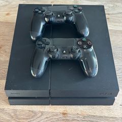 Sony PS4 and 2 controllers