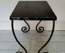 Wrought iron scroll leg side table